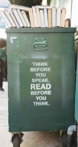 green book bin with sign "think before you speak, read before you think" which is good advice for those trying to overcome emotional abuse.